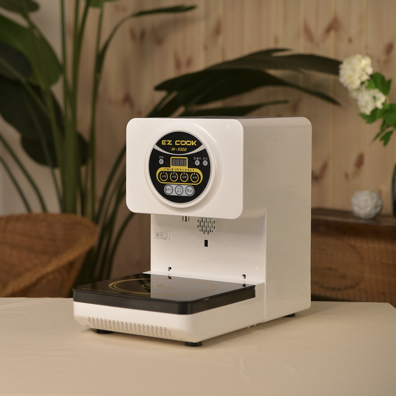 Can-ezcook IH5000 Ramyun Cooker, compact electric ramen cooker with digital controls and stainless steel interior for easy cooking.